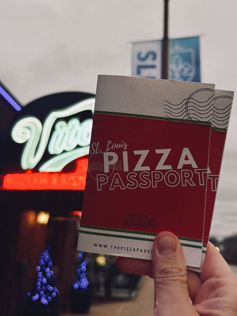 Passport under a neon sign